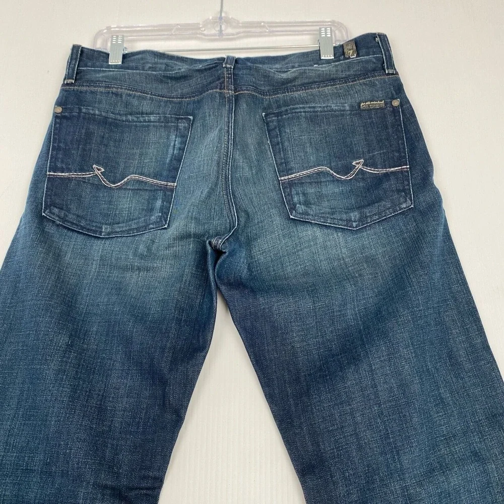 7 For All Mankind Men's Blue Skinny Jeans Size 33 Blue 100% Cotton with Pockets.